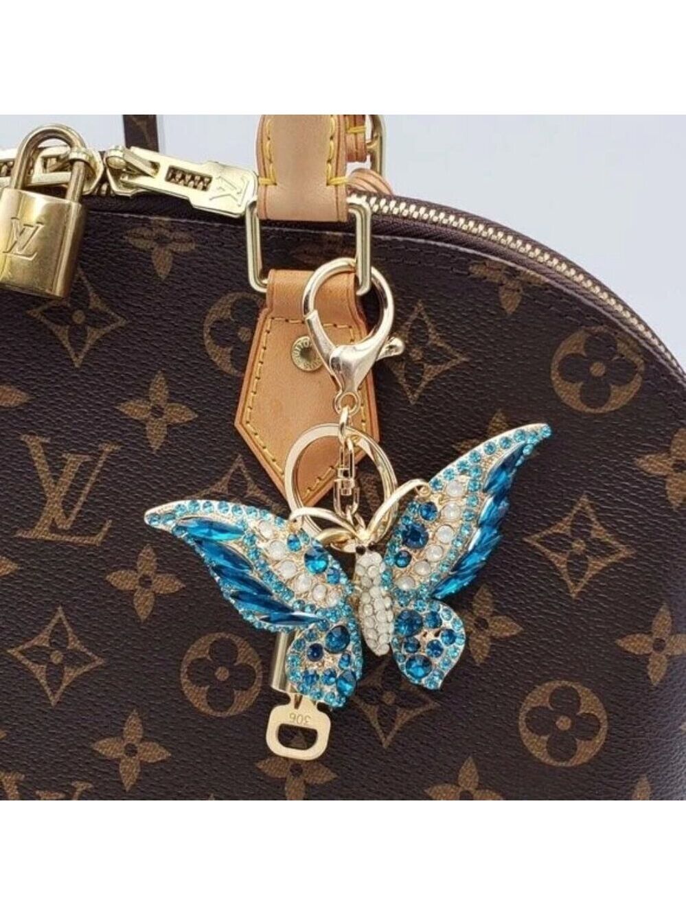 Authentic Louis Vuitton Lock & Key with unbranded Butterfly Bagcharm, Keycharm